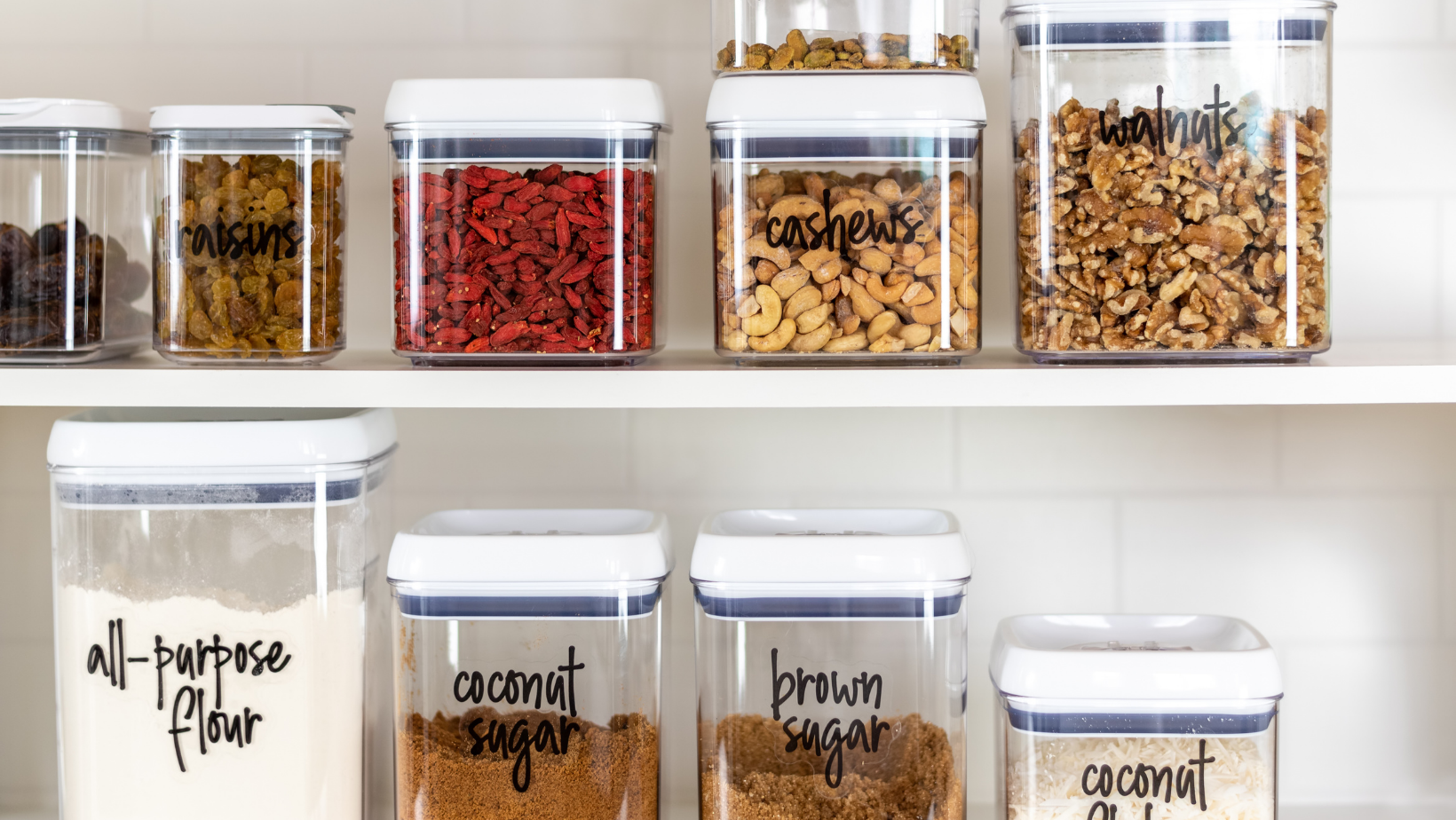 organizing pantry items with bins